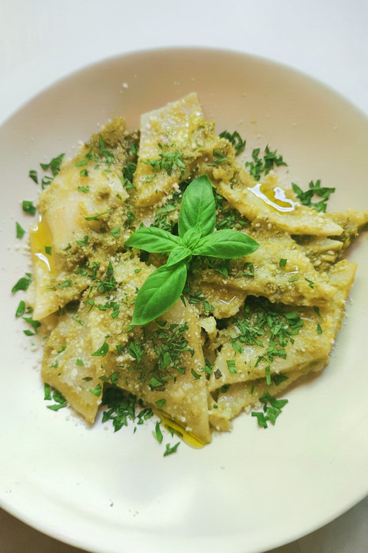 Recipe: Testaroli with olive oil, pecorino, and basil